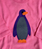 Long sleeved bubblegum pink organic cotton t-shirt for babies with applique penguin on the front. isabee