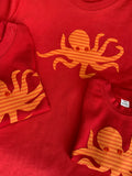 Octopus T-shirt for babies - organic cotton red coloured t-shirt with hand sewn stripy orange octopus on the front with orange eye detail - isabee.co.uk
