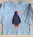 Long sleeved baby blue organic cotton t-shirt for babies with applique penguin on the front - isabee