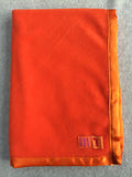 Handmade fleece baby blanket in Bright Orange with matching satin trim - isabee.co.uk