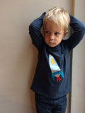 Rocket - Boy wearing navy blue long-sleeved t-shirt with hand applique rocket on the front. -isabee.co.uk