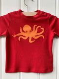 Octopus T-shirt for babies - organic cotton red coloured t-shirt with hand sewn stripy orange octopus on the front with orange eye detail - isabee.co.uk