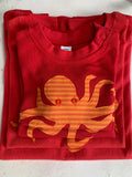 Octopus T-shirt for babies - organic cotton red coloured t-shirt with hand sewn stripy orange octopus on the front with orange eye detail - isabee.co.uk