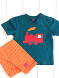100% organic cotton baby t-shirt in teal with red applique train and orange steam. Shown with soft cotton pumpkin orange stripy leggings. Handmade by Isabee.co.uk