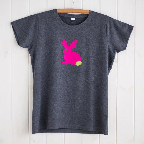 Dark grey melange women's fit t-shirt featuring a fuchsia pink appliqued rabbit with a leaf green tail. T-shirt is displayed on a hanger in front of a white panelled background. - isabee.co.uk